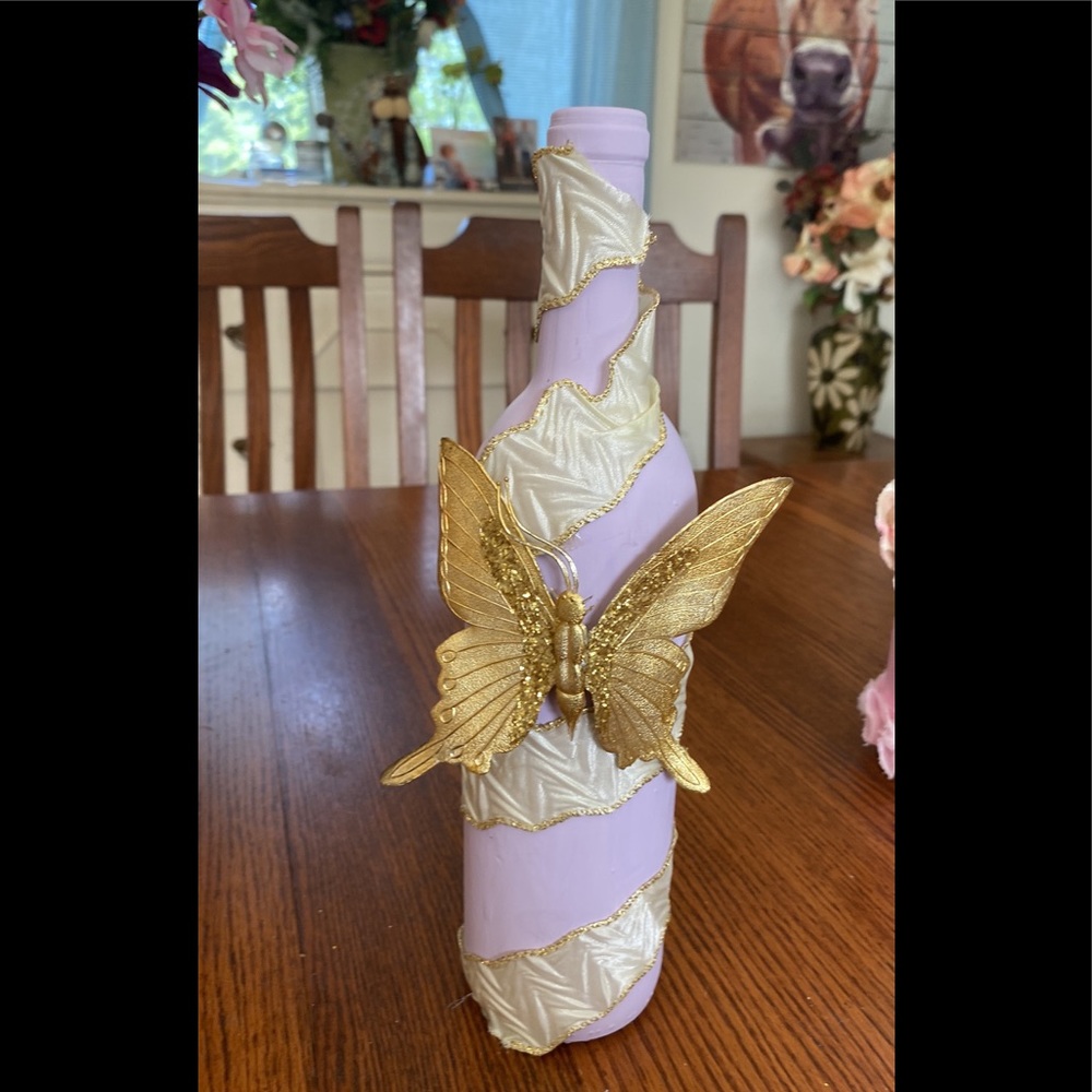 Handmade purple wine bottle vase. Decorated and painted  . 12” in
